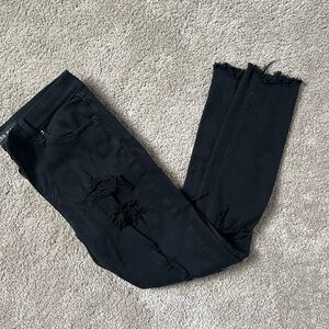 Mid rise black skinny ripped jeans